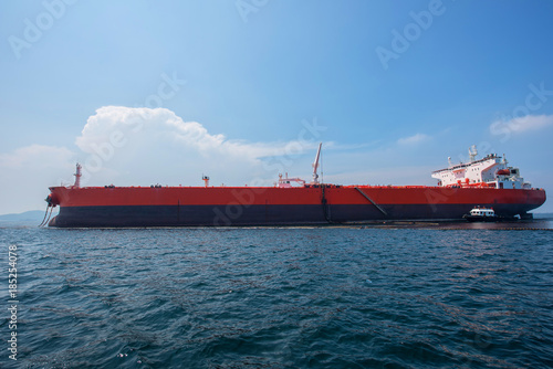 oil tanker, gas tanker in the high sea.Refinery Industry cargo ship,aerial view,Thailand, in import export, LPG,oil refinery, Logistics and transportation with working crane bridge in harbor