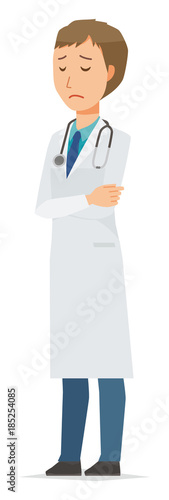 A young male doctor in a white suit is depressed