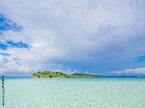 Landscape of clear blue sea and cloudy sky with island.