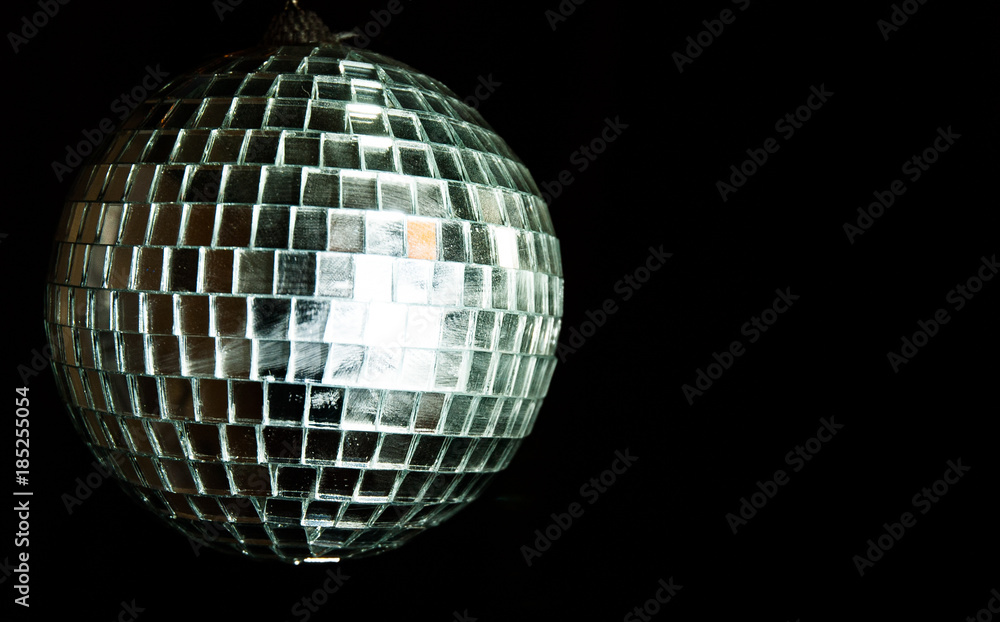 mirror ball on black background. with copy space. mirror ball on black background. with copy space.