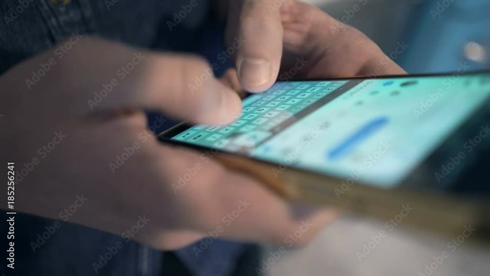 Teenager hands writing sms, texting on smartphone
Teenager hands writing sms, texting on smartphone