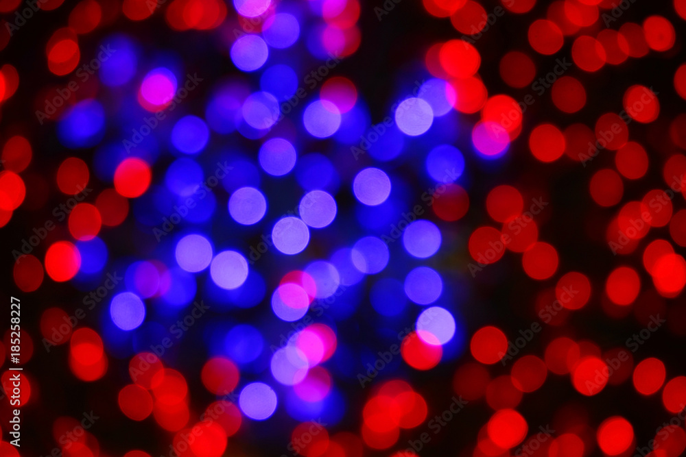 Bokeh from New Year's garlands in the form of snowflakes. Bokeh from New Year's garlands in the form of snowflakes.