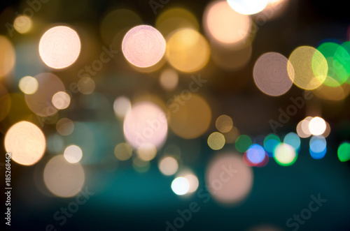Abstract blurry dark background with a lot of bokeh