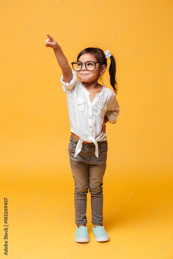 Happy excited little girl child pointing. Happy excited little girl child pointing.