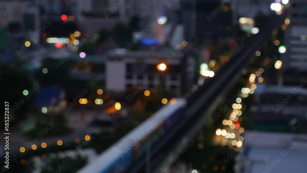 Defocused lights of a city at twilight time Defocused lights of a city at twilight time