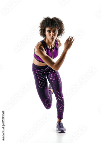 Young girl runner in silhouette isolated on white background. Dynamic movement. Sport and healthy lifestyle.