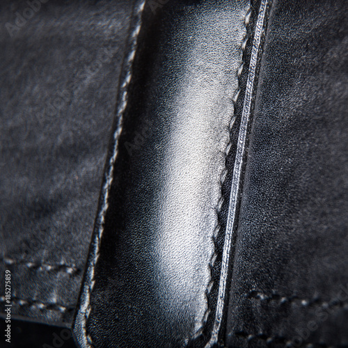 Close-up of a seam floss on a briefcase