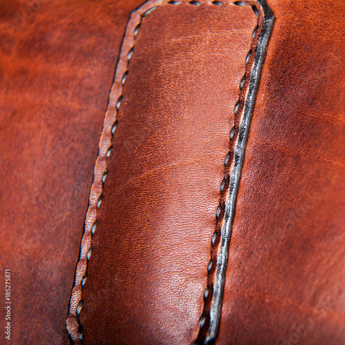 Close-up of a seam floss on a briefcase