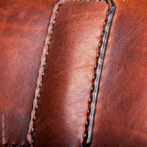 Close-up of a seam floss on a briefcase