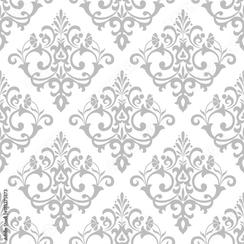 Wallpaper in the style of Baroque. A seamless vector background. Gray and white texture. Floral ornament. Graphic vector pattern.