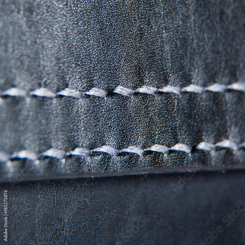 Close-up of a seam floss on a briefcase