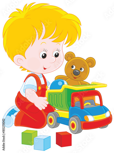 Vector illustration of a little boy playing with a toy truck  a teddy bear and cubes
