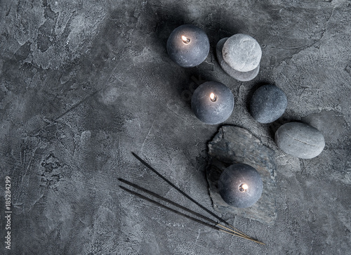 Photography Wax candles and massage stones, top view