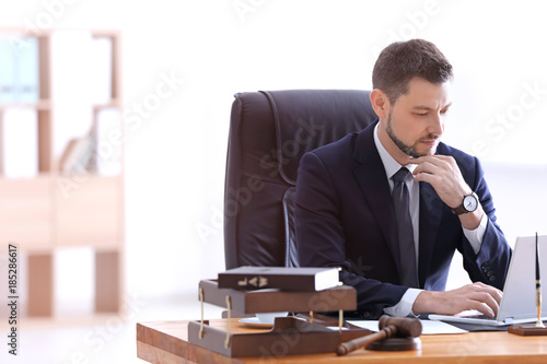 Young male notary working i...