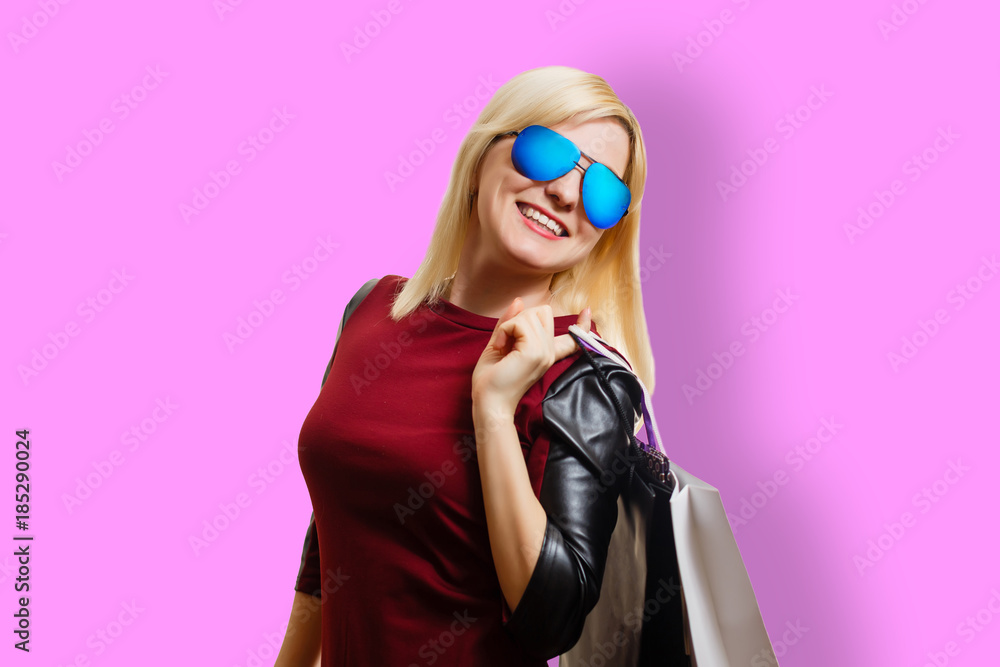 Woman in red dres after shopping isolated on white Woman in red dres after shopping isolated on white