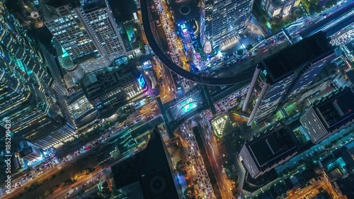 Time lapse,Hyperlapse ,Of traffic on city streets at night. Aerial view and top view of traffic on freeway, 4K.