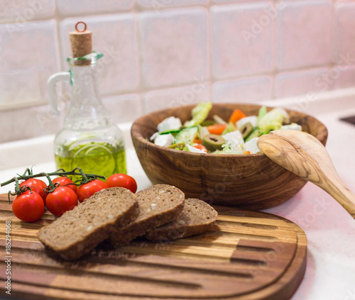 Greek salad  bread  cherry tomato and olive oil