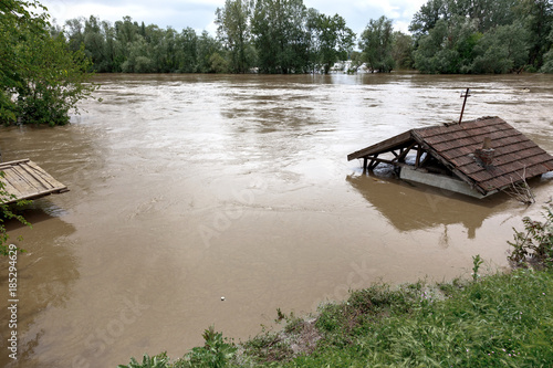 Flood water overflow the house. Weather or Hurricane disaster concept.