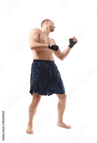 Attractive young boxer on white background