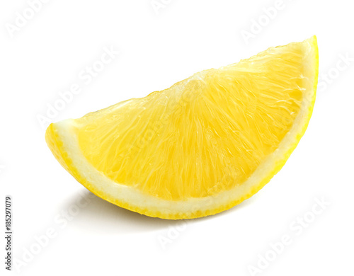 Slice of fresh ripe lemon on white background
