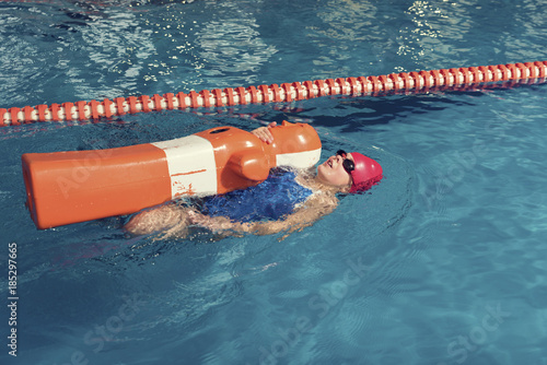 One Girl with Training Dummy in a Pool