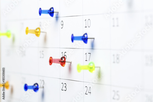 pushpins on calendar
