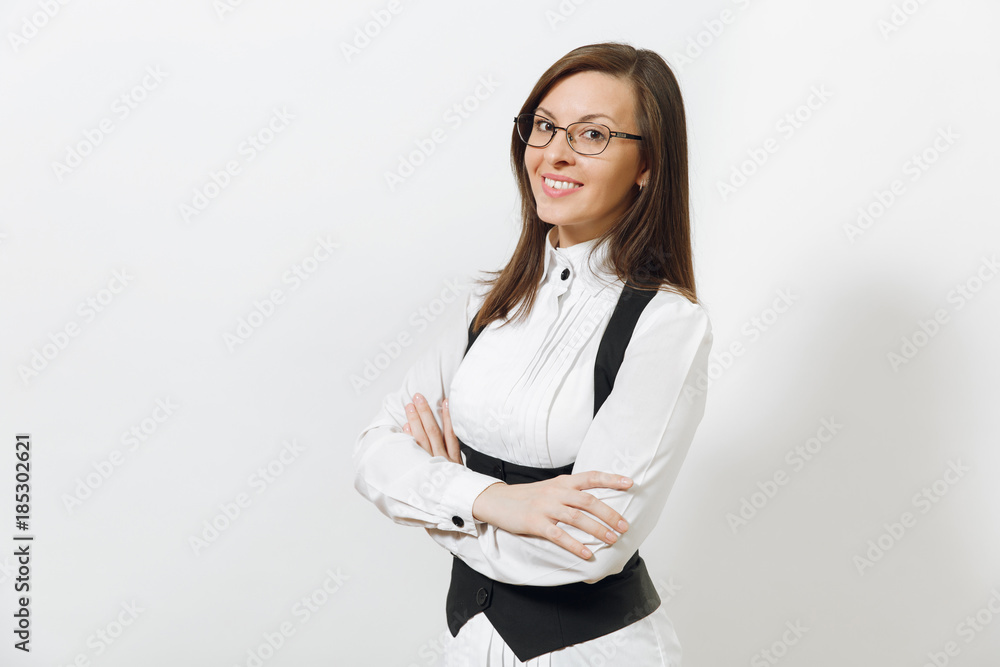 Beautiful caucasian young smiling brown-hair business woman in black suit, white shirt and glasses holding hands crossed isolated on white background. Manager or worker. Copy space for advertisement. Beautiful caucasian young smiling brown-hair business woman in black suit, white shirt and glasses holding hands crossed isolated on white background. Manager or worker. Copy space for advertisement.