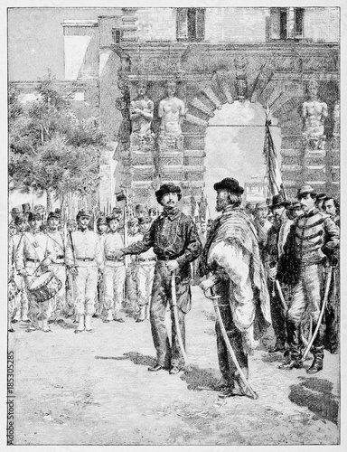 Garibaldi in his uniform in front of a parade in his onor. Visiting college to himself headed in Palermo and browsing young members. By E. Matania, on Garibaldi e i Suoi Tempi Milan Italy 1884 photo