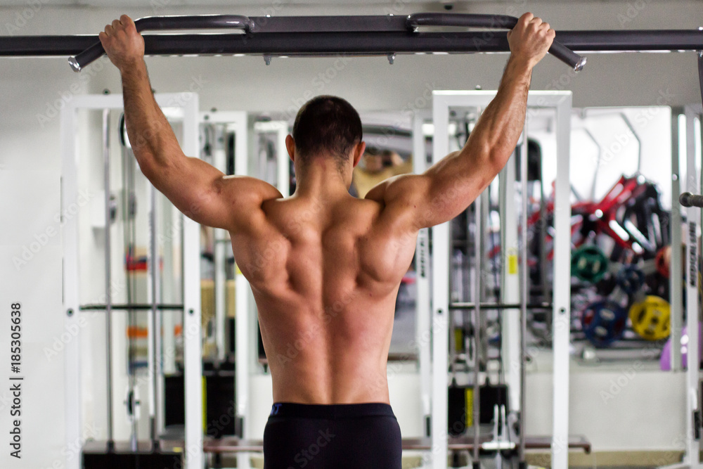 Fototapeta premium sport man men training in gym