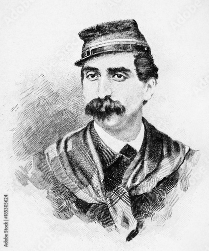 Old engraved closeup portrait of an ancient man with strong moustaches and a soldier hat. Giuseppe Guerzoni (1835 - 1886). By E. Matania published on Garibaldi e i Suoi Tempi Milan Italy 1884 