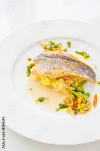 Cooked fish with vegetables
