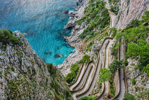 Winding stairs leading down to sea on a steep slope