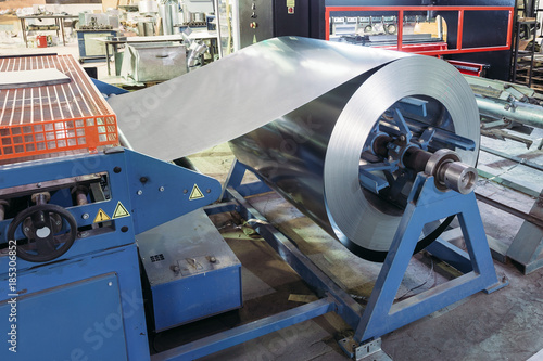 Roll of galvanized steel sheet for manufacturing metal pipes and tubes in the factory