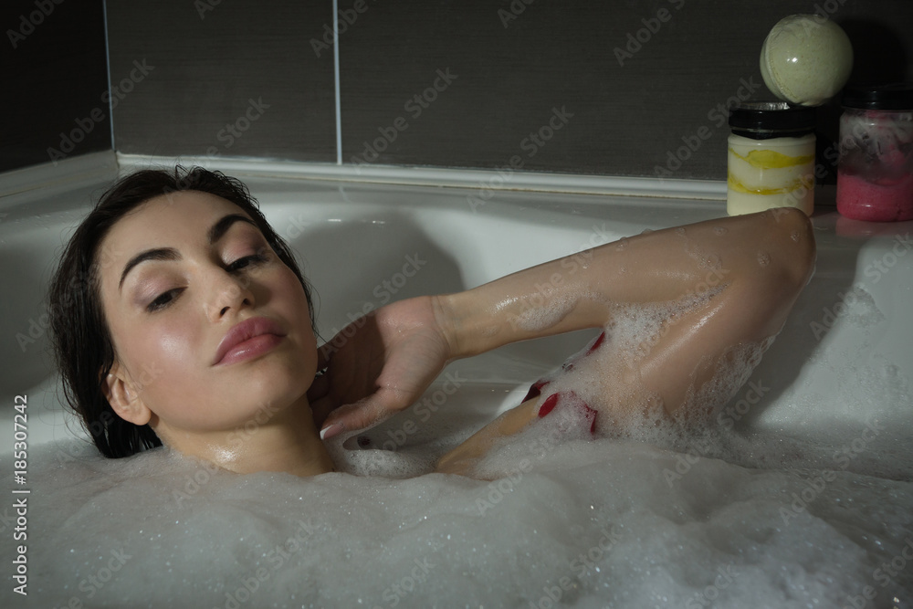 Fototapeta premium Beautiful sexy woman in a bathroom