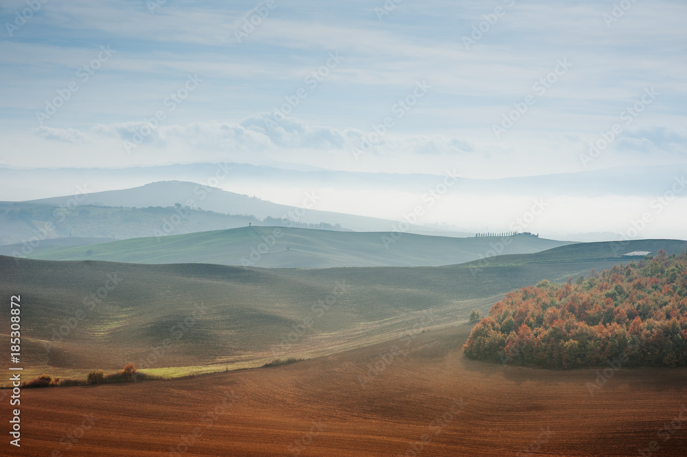 Tuscany landscape rolling hills panoramic view in an autumn day, Italy