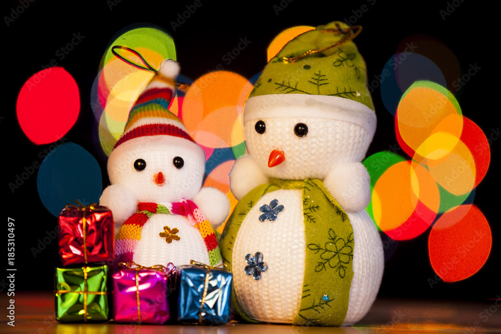 Festive snowman with Christmas light background Festive snowman with Christmas light background