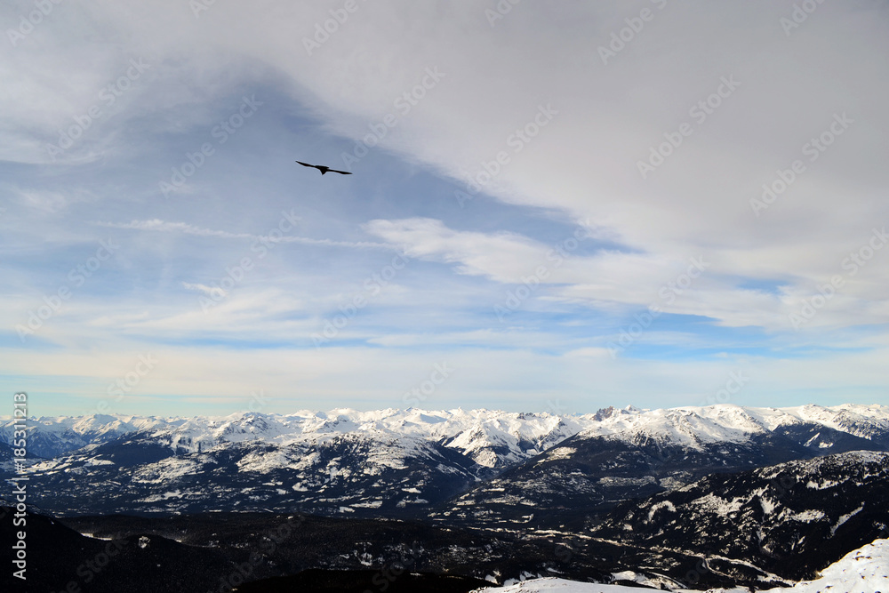 Landscape aerial view of the rocky Mountains full of snow seen from the ski slopes of Whistler, near Vancouver in British Columbia, Canada Landscape aerial view of the rocky Mountains full of snow seen from the ski slopes of Whistler, near Vancouver in British Columbia, Canada
