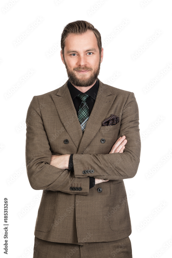 Handsome businessman in a brown suit with a black shirt and tie, standing against a white background with a smile on his face. Handsome businessman in a brown suit with a black shirt and tie, standing against a white background with a smile on his face.
