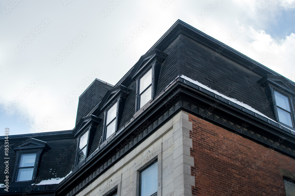 Expensive old houses with huge windows in Montreal downtown, Canada. Expensive old houses with huge windows in Montreal downtown, Canada.