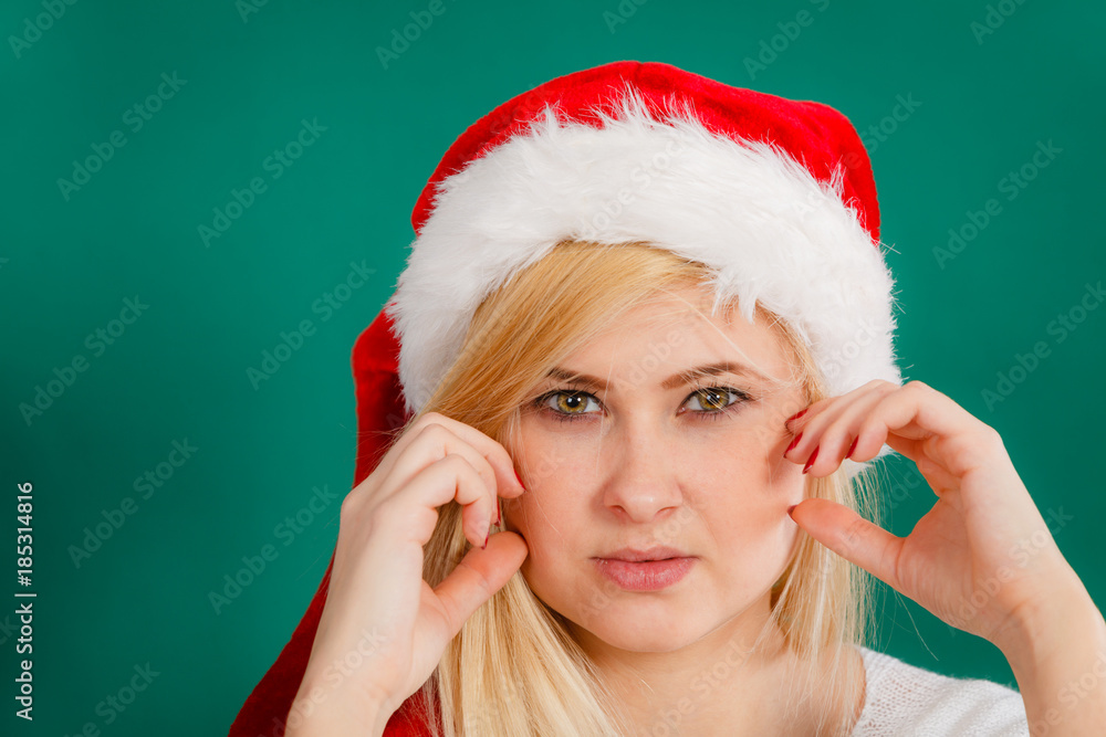 Woman wearing Santa Claus gesturing with hand Woman wearing Santa Claus gesturing with hand