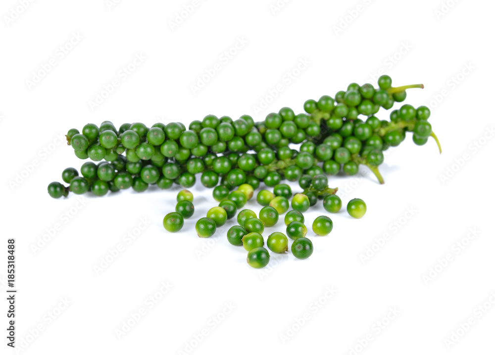 pile of green peppercorns on white background pile of green peppercorns on white background