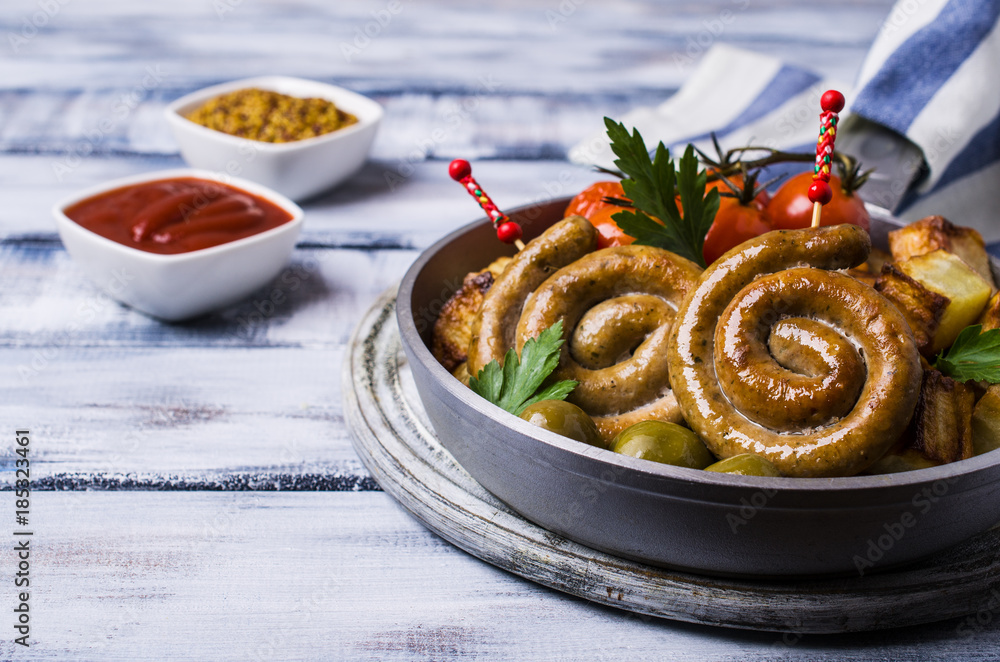 Round roast sausages with vegetables Round roast sausages with vegetables