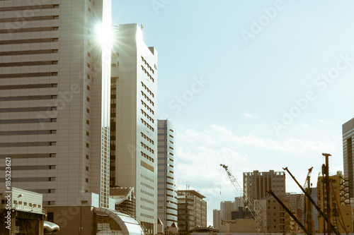 Newly constructed buildings next to a construction site in Tokyo, Japan
