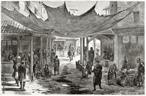 Ancient greek urban context with people living on a narrow street. The Agora Athens. Created by Proust published on Le Tour du Monde Paris 1862 photo
