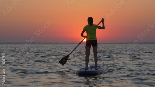 Stand up paddle board at sunset