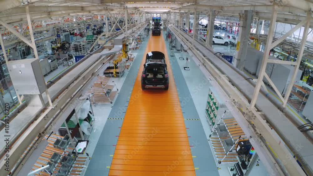 Automobile plant, modern production of cars, car body assembly process ...