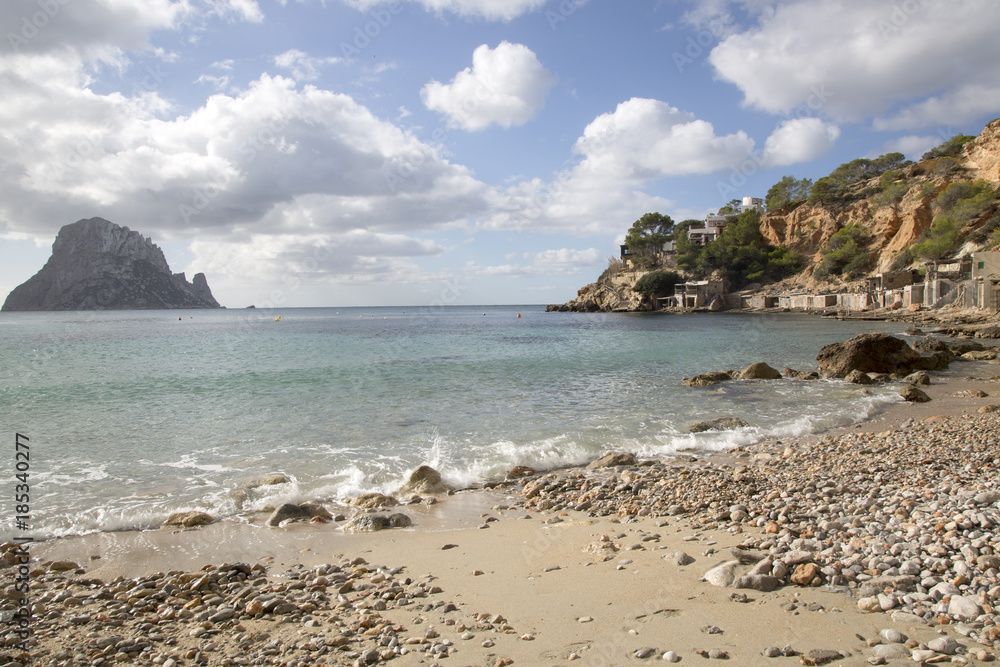 Fototapeta premium Cala d’Hort Cove Beach with Vedra Island, Ibiza