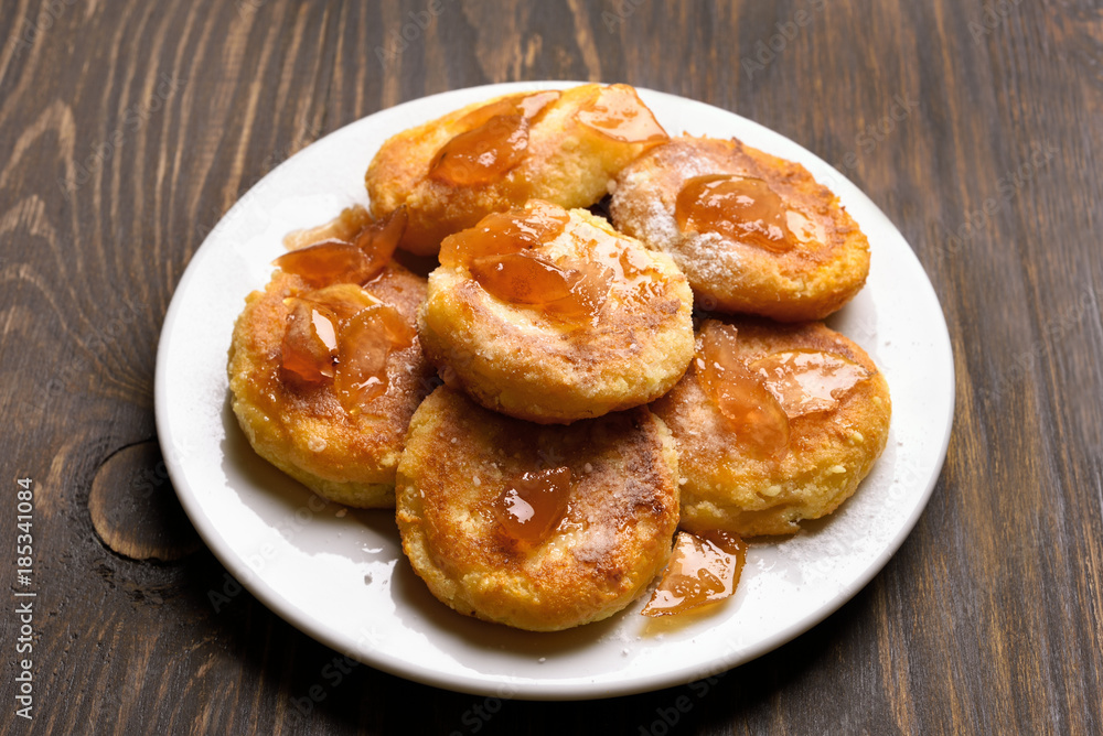 Curd cheese pancakes with caramelized apple slices Curd cheese pancakes with caramelized apple slices