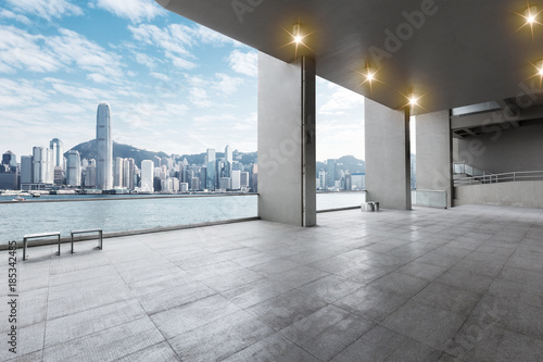 empty marble floor with cityscape of modern city