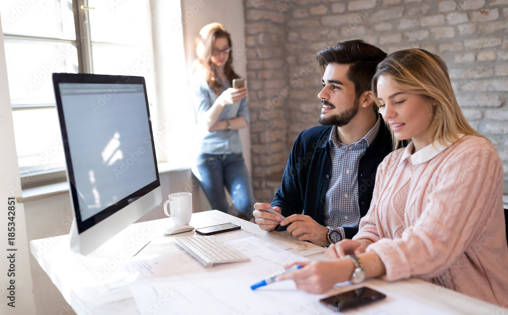 Fototapeta premium Coworking process, designers team working in modern office